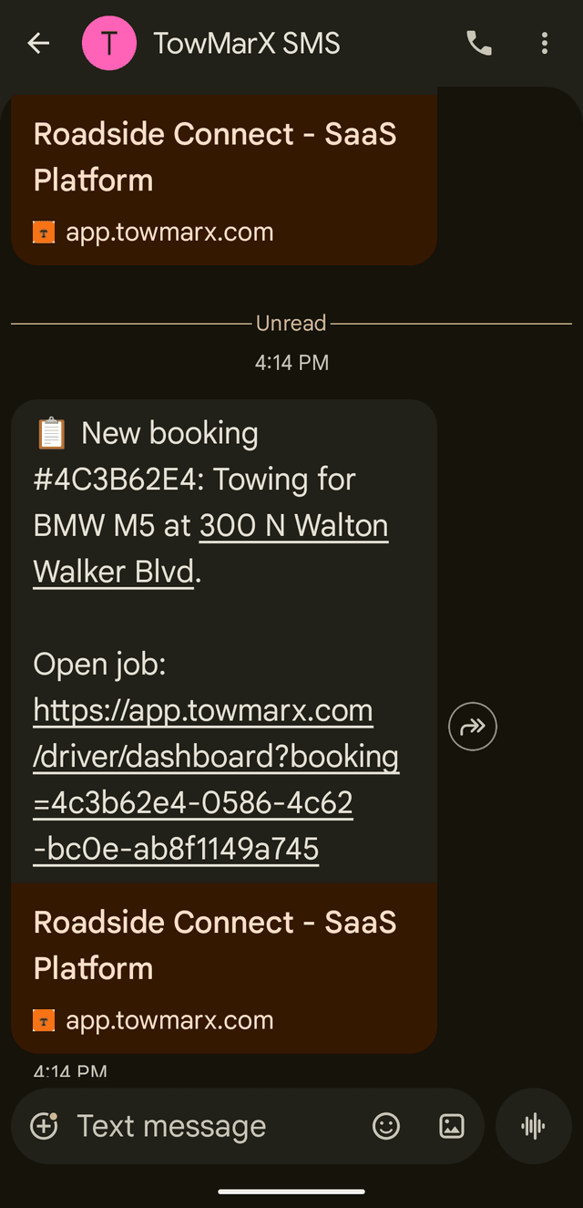SMS alert to a tow operator showing new booking details and one-tap accept link